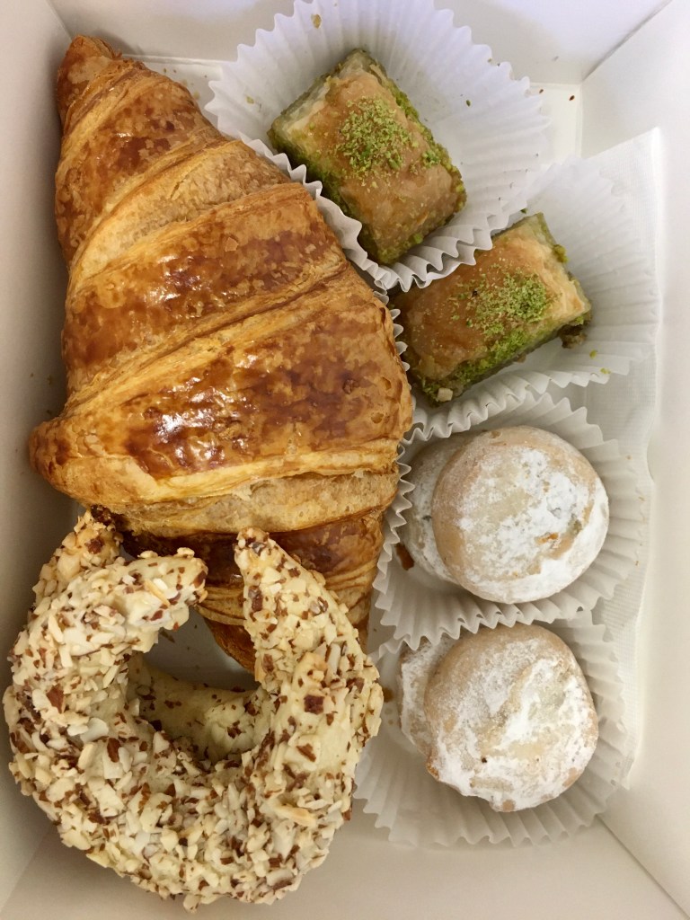 croissant and assorted cookies in a box