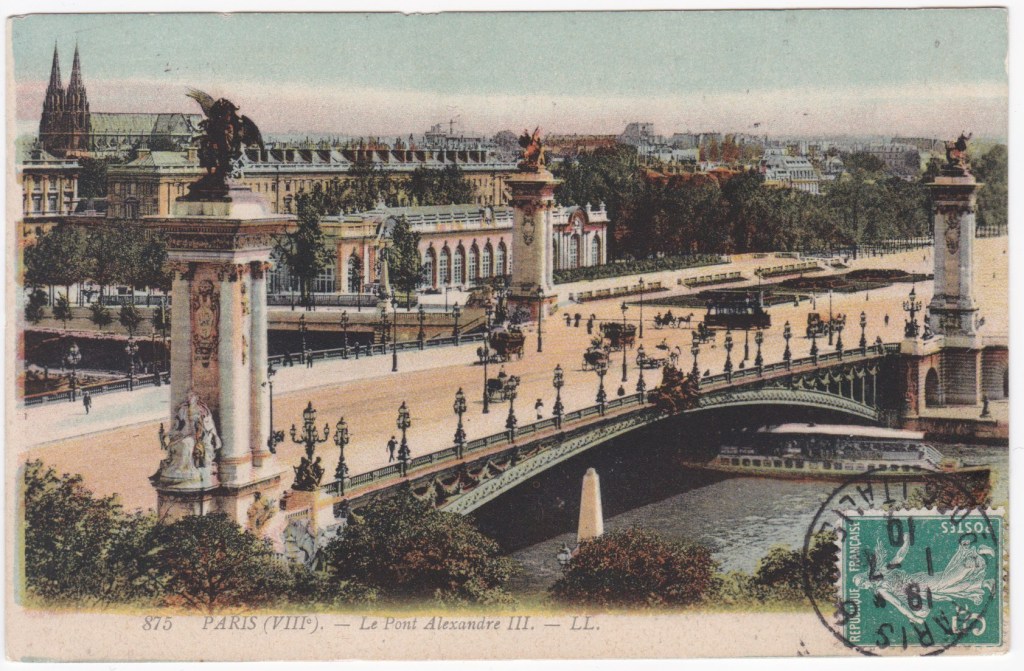colorized Paris postcard with image of Le Pont Alexandre with green postage stamp on front and July 1, 1910 postmark